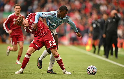 Victor Munoz and Nottingham Forest's English midfielder Callum Hudson-Odoi vie for the ball on Saturday