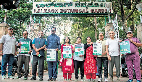 Lalbagh Walkers’ Association protests outside Lalbagh urging the government to scrap tunnel road project