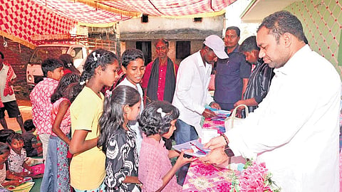 Rengali MLA Sudarsan Haripal with students.