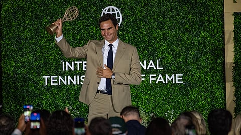 Swiss former tennis player Roger Federer accepts his induction into the International Tennis Hall of Fame during a ceremony in Newport, Rhode Island, on August 29, 2026.