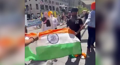 Khalistani separatists desecrate the Indian flag outside Madison Square Garden in New York on Saturday.