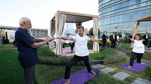 Prime Minister Narendra Modi participates in a yoga programme organised by the Yoga Federation of Uzbekistan, in Tashkent on Sunday.