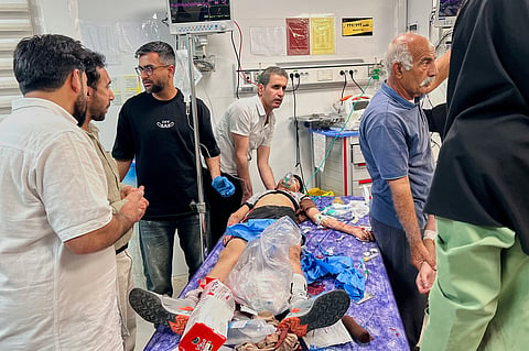 A boy injured in a strike receives treatment at a hospital in Lamerd, southern Iran, Saturday, Feb. 28, 2026.