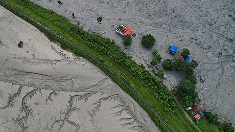 A drone view shows a major section of Pasang Lhamu highway washed away along the swollen Trishuli river by recent flash floods, cutting off Rasuwa district from Nuwakot area, Nepal, Monday, Aug. 31, 2026.