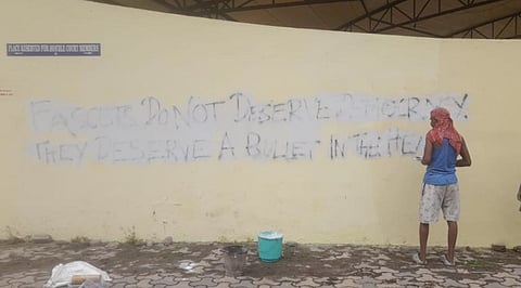 The graffiti being erased at Jadavapur University.