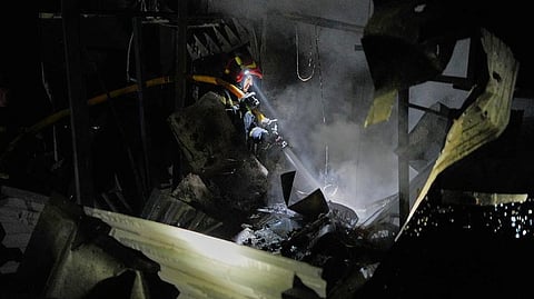 In this photo provided by the Ukrainian Emergency Service, firefighters put out a fire following a Russian missile attack in Kyiv, Ukraine, Tuesday, Sept. 1, 2026