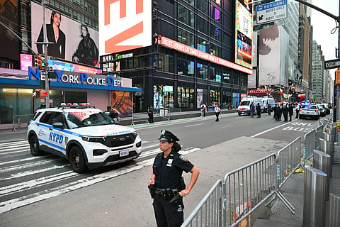 New York City Police secure the area where an officer-involved shooting left one dead near Times Square, in New York, on August 31, 2026.