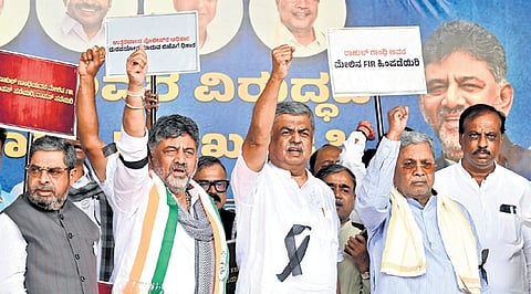 Chief Minister DK Shivakumar, KPCC chief BK Hariprasad, former CM Siddaramaiah and other Congress leaders show support for Leader of Opposition in Lok Sabha Rahul Gandhi during a protest in Bengaluru on Wednesday