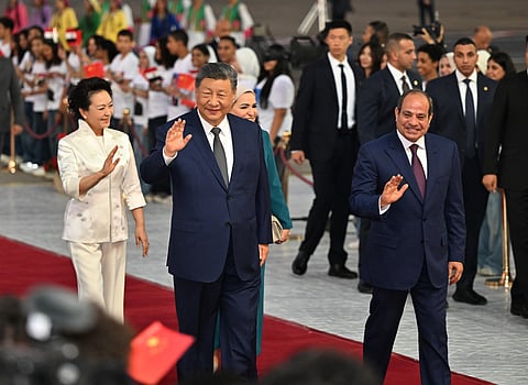 In this photo released by Xinhua News Agency, Chinese President Xi Jinping, second left, and his wife Peng Liyuan, left, are welcomed by Egyptian President Abdel-Fattah el-Sissi, right, and his wife Entissar Amerupon on their arrival at Cairo International Airport in Cairo, Tuesday, Sept. 1, 2026.