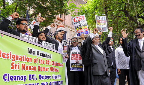 Members of the All India Lawyers Union (AILU) Telangana State Committee raise slogans during a protest demanding the resignation of Bar Council of India (BCI) Chairman Manan Kumar Mishra, in Hyderabad, Friday, Aug. 21, 2026.