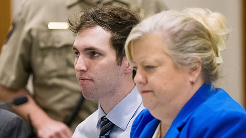 FILE - Tyler Robinson, who is accused of fatally shooting Charlie Kirk, sits beside defense attorney Kathryn Nester during a hearing in 4th District Court in Provo, Utah, on Jan. 16, 2026.