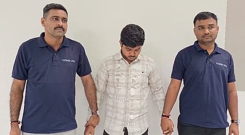 The accused Aditya Pandey (centre).