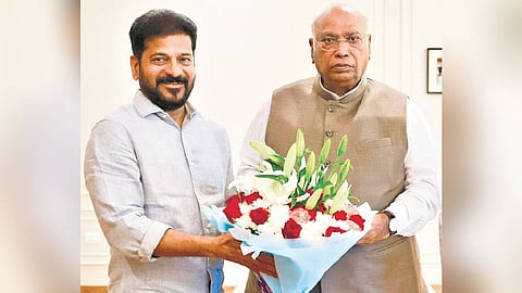 Chief Minister A Revanth Reddy greets AICC president Mallikarjun Kharge on Wednesday.