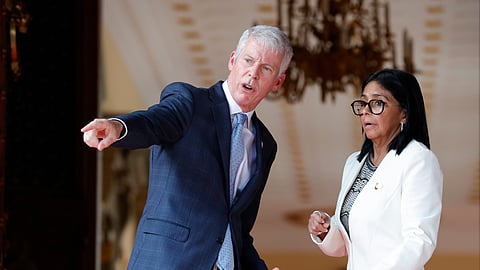 US Energy Secretary Chris Wright, left, points next to Venezuelan acting President Delcy Rodriguez as they speak to the press after the signing of an oil agreement between the U.S. and Venezuela at Miraflores presidential palace in Caracas, Venezuela, Wednesday, Sept. 2, 2026.