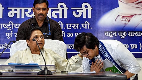 In this photo from May 24, 2026, Bahujan Samaj Party (BSP) supremo Mayawati, with her nephew Akash Anand, during a meeting with party office bearers at the party office in Lucknow.
