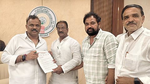 Revenue employees association leaders submitting a representation to the revenue Anagani Satya Prasad on Wednesday.