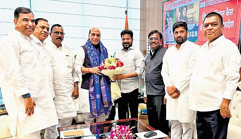 Chief Minister A Revanth Reddy greets Defence Minister Rajnath Singh in New Delhi on Wednesday.