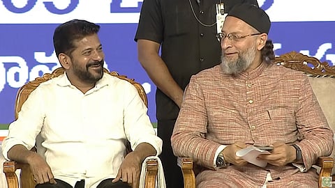 Chief Minister A Revanth Reddy along with Hyderabad MP Asaduddin Owaisi after inaugurating Nalgonda X Road steel flyover at Chanchalguda in Hyderabad.