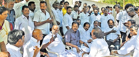 A large number of DMK functionaries sat outside former minister KN Nehru’s residence during the search in Tiruchy on Saturday