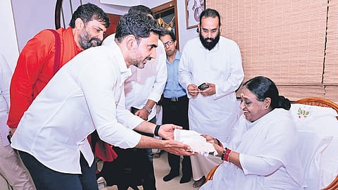 Minister for HRD and IT Nara Lokesh on Friday visited the renowned Amritapuri Ashram in Kerala’s Kollam district and met spiritual leader Amma.