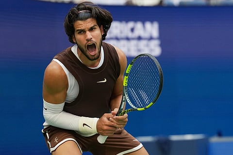 Carlos Alcaraz reacts during his third round match against Yibing Wu at the US Open on Friday