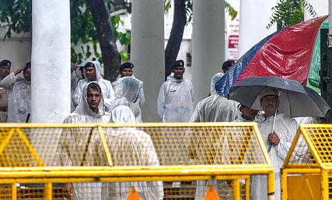 Police personnel stand guard outside Parliament Street police station following the detention of self-styled Hindutva influencer Swatantra Bhardwaj over the alleged assault of Sanjay Kumar, father of CJP protester Nishu Azad, in New Delhi, Saturday, Sept. 5, 2026.