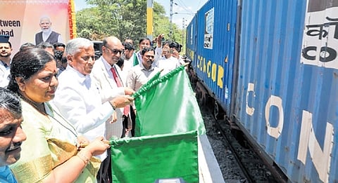 Union Minister of State for Railways V Somanna flags off the goods train at Whitefield Railway Station.
