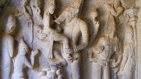 A sculpture depicting Lord Vishnu's Varaha avatar and Mother Earth in Mahabalipuram, Tamil Nadu