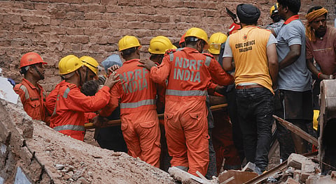 Rescue operation underway after a building collapsed at Satya Niketan area, in New Delhi, Sunday, Sept. 6, 2026.