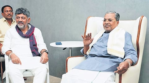 With Chief Minister DK Shivakumar set to complete 100 days in office on Thursday, he calls on his predecessor Siddaramaiah in Bengaluru on Tuesday | Express