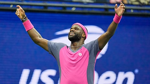 Frances Tiafoe, of the United States, celebrates winning a match against Alex Michelsen, of the United States, during the quarterfinal round of the U.S. Open tennis championships, Tuesday, Sept. 8, 2026, in New York.