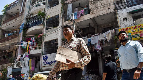 Municipal Corporation of Delhi (MCD) officials inspect student paying guest (PG) accommodations in the Satya Niketan area following the collapse of a multi-storey building, in New Delhi, Wednesday, Sept. 9, 2026.