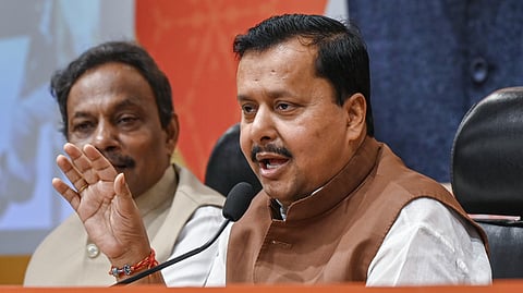 BJP National President Nitin Nabin addresses a press conference during the announcement of the 'Seva Sankalp Abhiyan' at the party headquarters, in New Delhi, Wednesday, Sept. 9, 2026. BJP leader Vinod Tawde, left, is also seen.