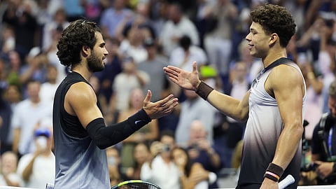 Ben Shelton, right, of the United States, is congratulated by Carlos Alcaraz, of Spain, after winning their match in the quarterfinal round of the U.S. Open tennis championships, Wednesday, Sept. 9, 2026, in New York.