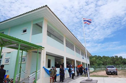 In this photo released by the Chonburi government's Public Relations Department, police officers gather inside Nongplalai Municipal Kindergarten after a gunman fatally shot a teacher in Chonburi, Thailand, Wednesday, Sept. 9, 2026.