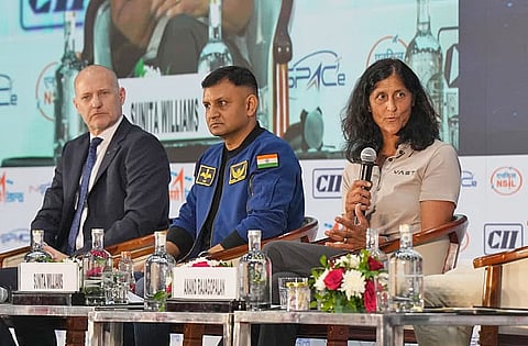 Vice-president of Crew Partnerships at Vast Space Tom Shelley, Group Captain and astronaut Angad Pratap, and astronaut Sunita Williams during an interaction at Bengaluru Space Expo, in Bengaluru, on Wednesday.