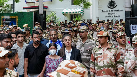 Azad Samaj Party supremo and MP Chandrashekhar Ravan, Cockroach Janta Party (CJP) spokespersons Saurav Das and Ashutosh Ranka along with CJP protester Nishu Azad, after a meeting with the police officials at the Parliament Street police station, during a protest by CJP demanding action against self-styled Hindutva influencer Swatantra Bhardwaj over the alleged assault on Nishu's father, Friday, Sept. 4, 2026.