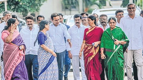 BRS Working president K T Rama Rao along with Party Cadre coming out of LOK Bhavan after meeting Governor Shiv Pratap Shukla at on Wednesday.
