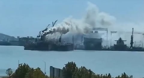 Smoke billows from a foreign-flagged cargo ship after a fire broke out at a port in Qingdao, China, September 10, 2026.