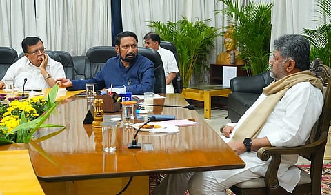 Chief Minister DK Shivakumar chairs a meeting on the Apex Bank elections at his official residence on Wednesday.