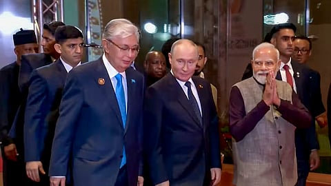 Prime Minister Narendra Modi with Russian President Vladimir Putin as they arrive at Bharat Mandapam to attend a dinner hosted for visiting dignitaries of the 18th BRICS Summit, in New Delhi.