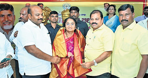 BC Welfare Minister S Savitha being felicitated at the coordination and awareness meeting on the proposed BC Protection Act, at Gollapudi on Saturday.