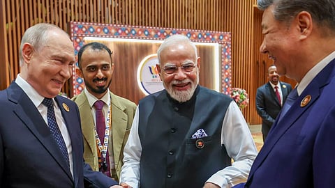In this image posted on Sept. 12, 2026, Prime Minister Narendra Modi with Russian President Vladimir Putin and Chinese President Xi Jinping during the 18th BRICS Summit, at the Bharat Mandapam, in New Delhi.