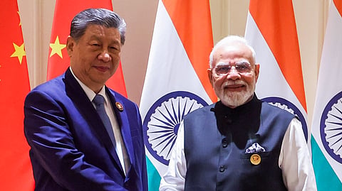 In this photo from Sept. 12, 2026, Prime Minister Narendra Modi and Chinese President Xi Jinping exchange a handshake during a bilateral meeting at the 18th BRICS Summit in New Delhi on Saturday.