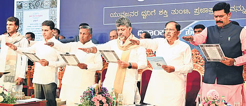 Chief Minister DK Shivakumar, Deputy Chief Minister Dr G Parameshwara and other ministers at the inauguration of the International Day of Democracy celebrations at Vidhana Soudha in Bengaluru on Tuesday