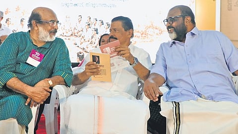 Former minister Thomas Isaac (left), CPM state secretary MV Govindan (centre) and Transport Minister C P John (right) during the 30th anniversary celebrations of the People’s Planning Campaign in Kerala, in Thiruvananthapuram.