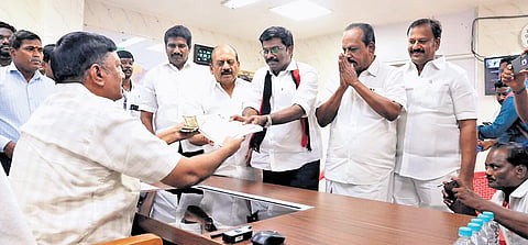 DMK’s Paranthamen submitting his papers to the Returning Officer