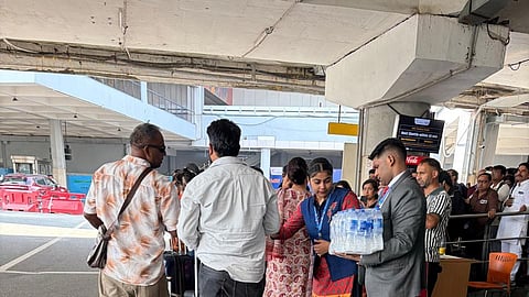 Photos shared by Delhi airport revealed deserted terminals and its staff offering water to passengers waiting for long for buses