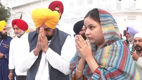 Punjab CM Bhagwant Mann with his wife Dr Gurpreet Kaur at Golden Temple.