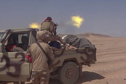 This frame grab taken from AFPTV video footage shows fighters affiliated with the Saudi-backed Yemeni government engaging in clashes with Houthi authorities in Al-Jawf province on September 15, 2026.